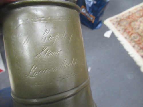 Lot 5 - Six antique pewter mugs marked with standard...