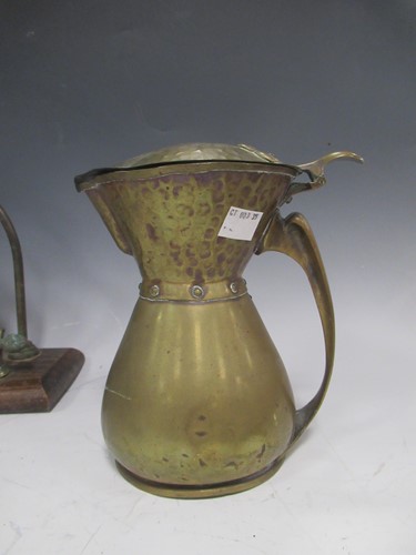 Lot 23 - A reproduction bronze female figure on a swing...