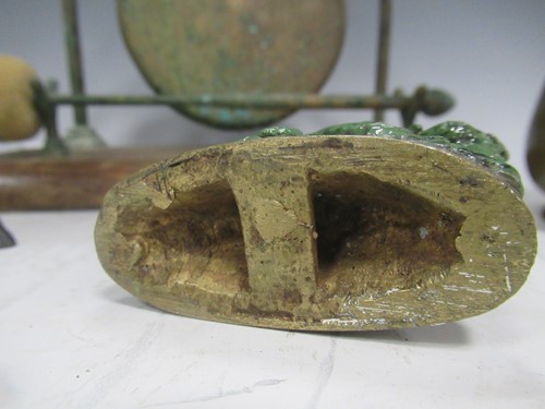 Lot 23 - A reproduction bronze female figure on a swing...