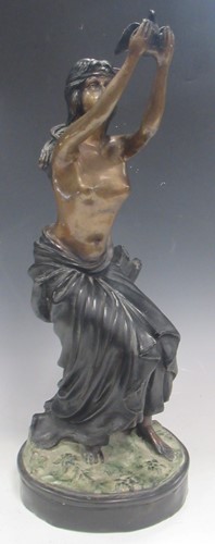 Lot 33 - A modern bronze model of a draped young woman...
