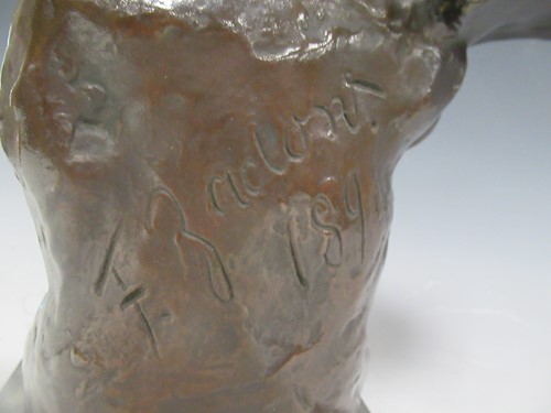 Lot 33 - A modern bronze model of a draped young woman...