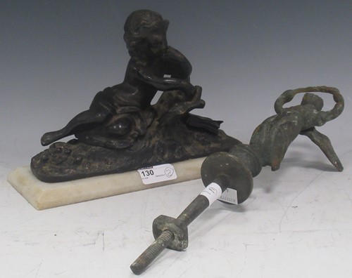 Lot 130 - A bronze sculpture of a reclining figurer...