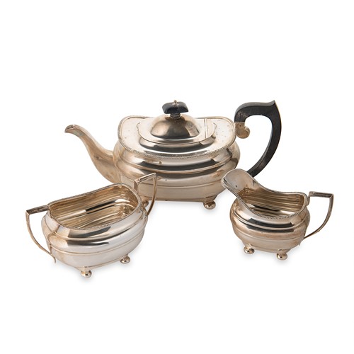Lot 419 - A George V silver three-piece tea set