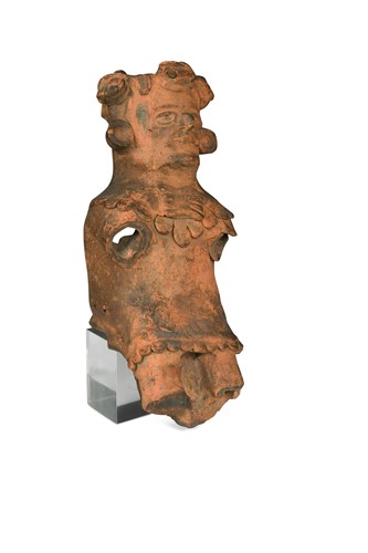Lot 496 - A Pre-Columbian terracotta seated figure with crown