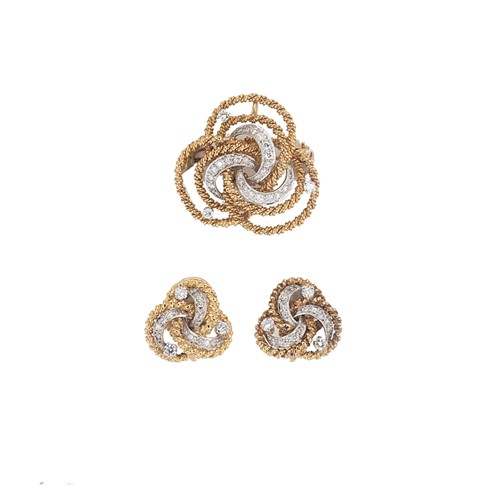 Lot 153 - A late 20th century 18ct gold diamond set pendant/brooch and matching ear studs