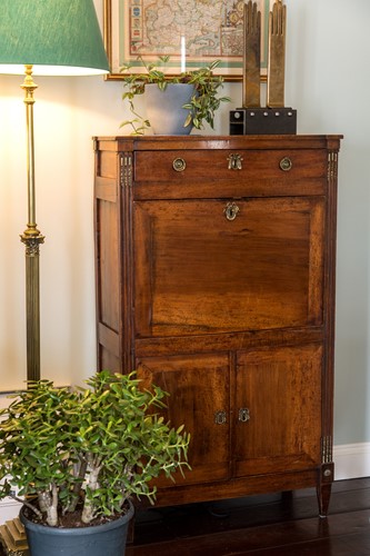 Lot 620 - A French walnut and gilt metal mounted secretaire abattant, early 19th century