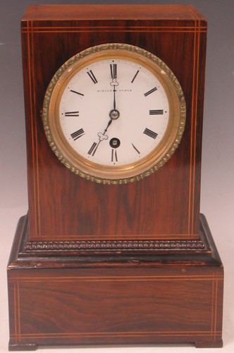 Lot 56 - A small rosewood and brass mantel clock by...