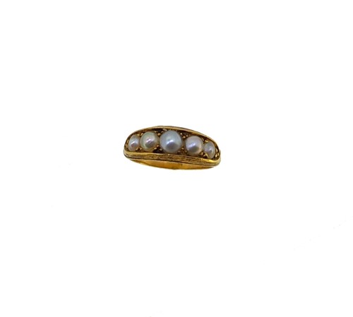 Lot 32 - A Victorian pearl half hoop style ring