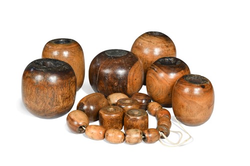 Lot 518 - A collection of turned lignum vitae plumbing balls,  19th century