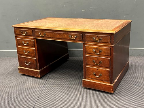 Lot 627 - A George III style pedestal desk, 20th century,...