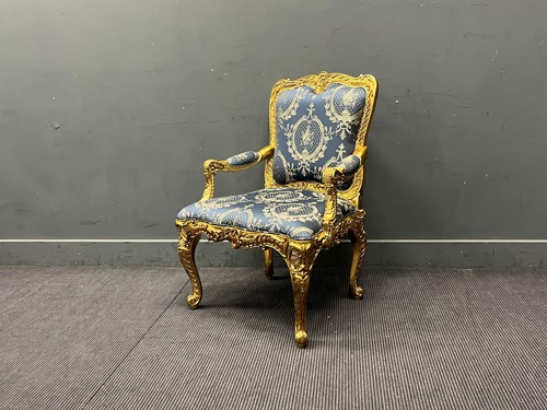 Lot 550 - A Louis XV style giltwood fauteuil, the frame...