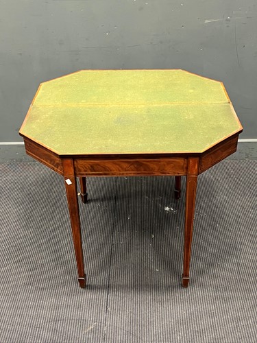 Lot 553 - A George III mahogany card table with...