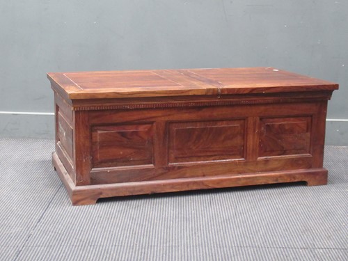 Lot 641 - An Eastern hard wood chest, modern, with twin...