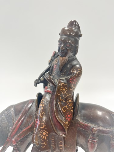 Lot 163 - A Chinese painted bronze figure or censer of a Confucian scholar on horseback, early 20th century