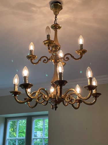 Lot 672 - A Dutch style lacquered brass two tier ceiling...