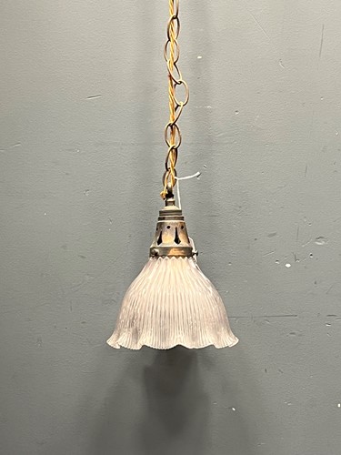 Lot 677 - A late 19th century brass and glass pendant...