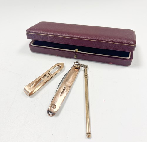 Lot 397 - A 9ct gold swizzle stick, a 9ct gold and steel...