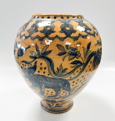 Lot 6 - A Persian ovoid vase