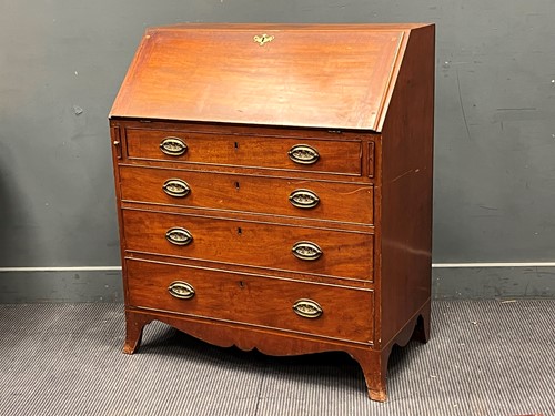 Lot 733 - A Regency mahogany bureau, with slope front...