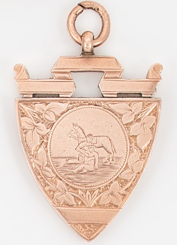 Lot 214 - An early 20th century 9ct rose gold fob pendant