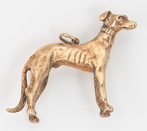 Lot 215 - A fob pendant in the form of a dog