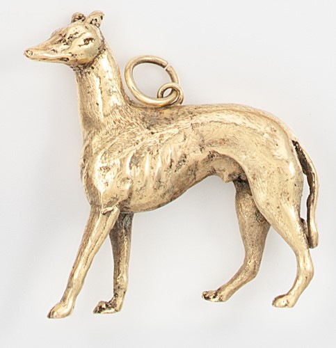 Lot 209 - A 9ct gold fob pendant in the form of a dog