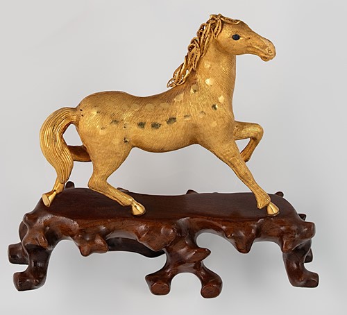 Lot 229 - An Asian metalwares ornament in the form of a horse