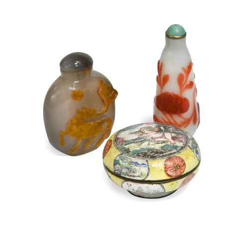 Lot 30 - A Chinese Canton enamel small boy and dog box and cover, Qing Dynasty 18/19th century