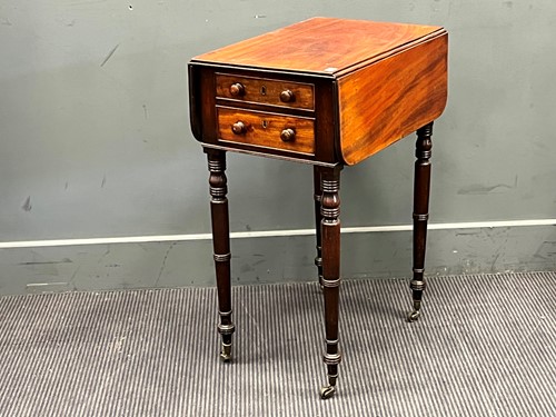 Lot 399 - A Victorian mahogany dropflap sewing table 72...