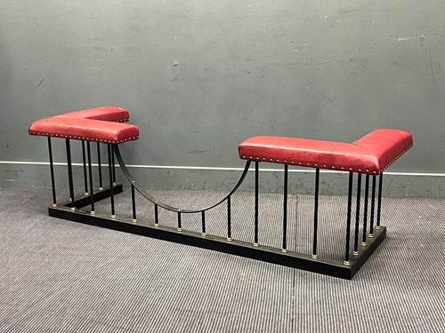Lot 401 - A leather and black painted frame club fender...