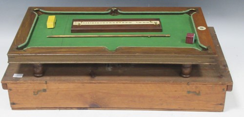 Lot 81 - A 'Nuku' patent miniature oak billiard table,...