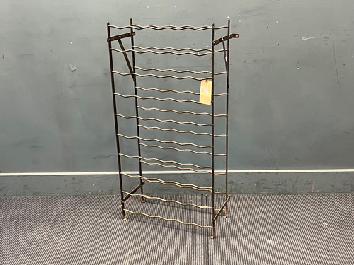 Lot 395 - A wrought iron 50 bottle wine rack, 102 x 52 x...