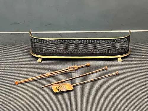 Lot 456 - A pierced brass fender 24 x 101 x 29cm;...
