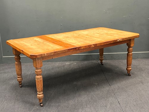 Lot 404 - A late Victorian stripped pine kitchen dining...