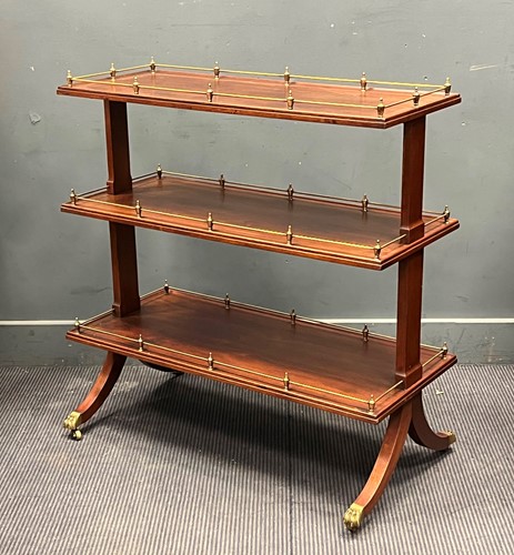 Lot 294 - A Regency style mahogany three-tier buffet or...
