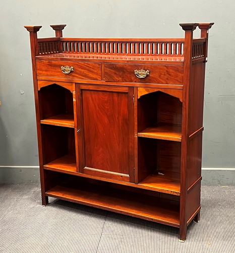 Lot 397 - An Arts and Crafts mahogany bookcase, with...