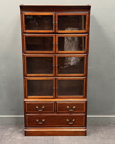 Lot 414 - A mahogany crossbanded sectional bookcase 172...