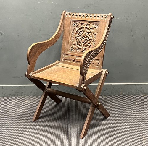Lot 390 - A Victorian oak Glastonbury armchair with...