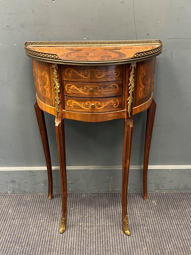 Lot 282 - An Italian marquetry bow front side table,...