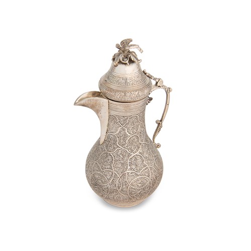 Lot 276 - A late 20th century Egyptian metalwares silver Dallah coffee pot