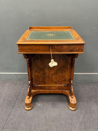 Lot 335 - A Victorian walnut Davenport, with gilt tooled...
