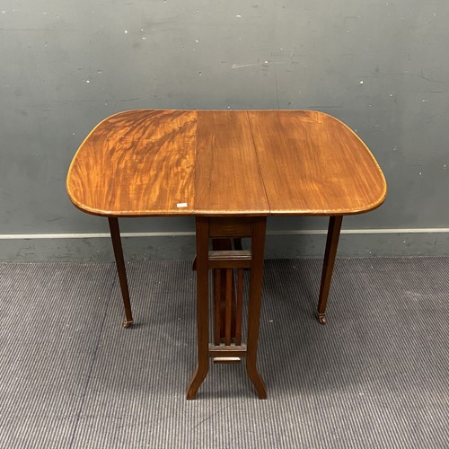 Lot 331 - A George III style carved mahogany fluted...