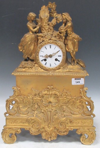 Lot 145 - A late 19th century French gilt metal mantel...