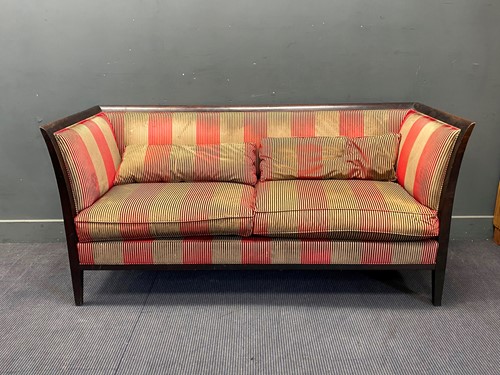 Lot 341 - An Art Deco style ebonised three seat sofa,...