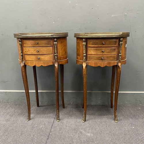 Lot 404 - A pair of Louis XVI style walnut veneered oval...