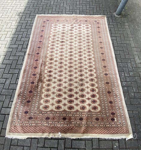 Lot 861 - A modern Bokhara style carpet, with multiple...
