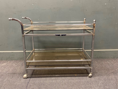 Lot 287 - A modern glass and chrome two-tier drinks...