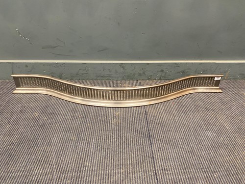 Lot 750 - A George III serpentine steel fender 135cm wide