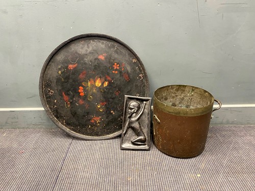 Lot 724 - A painted tole circular tray with pierced edge...