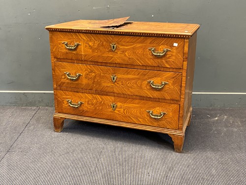 Lot 298 - A burrwood veneered chest of three long...